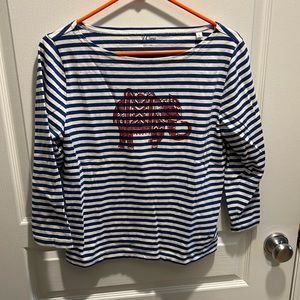 Blue striped shirt with pink elephant
